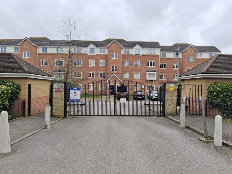 Photo 1: Private estate with parking