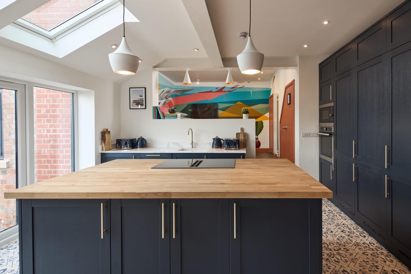 Photo 1: Communal kitchen with 5 ring induction hob and 2 ovens