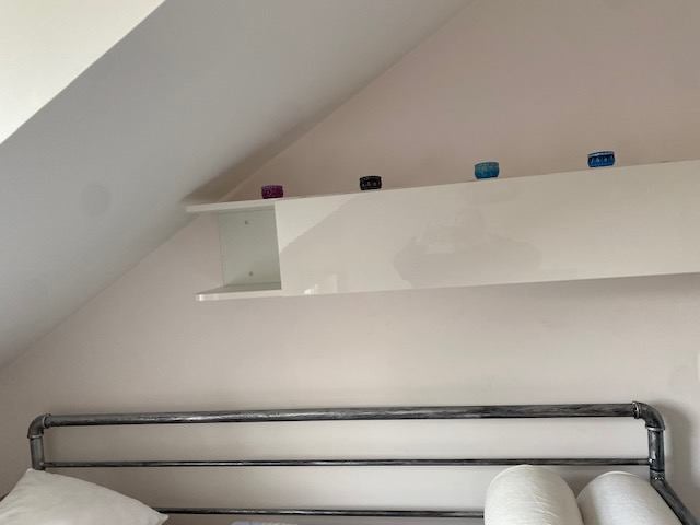 Photo 1: In the Eaves of the house