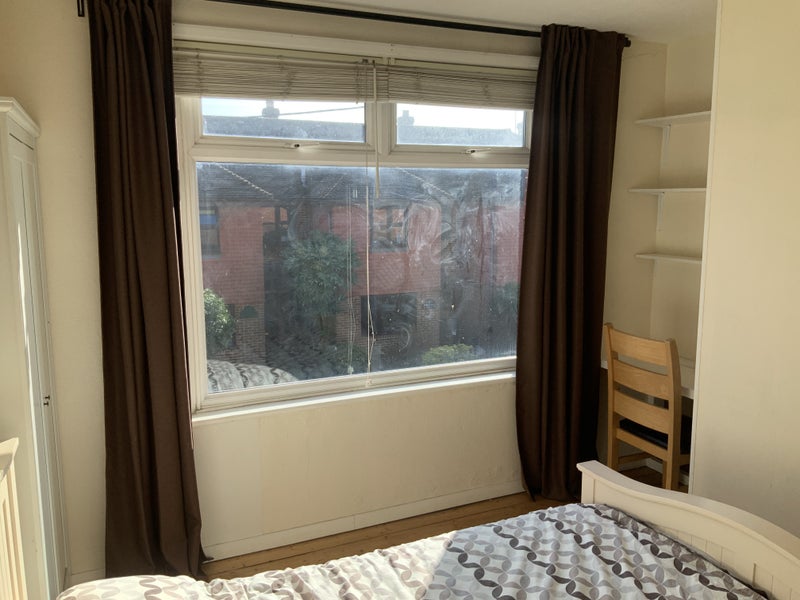 Photo 1: South facing room bright and sunny