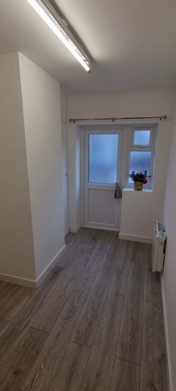 Photo 1: Entrance from outside into the space