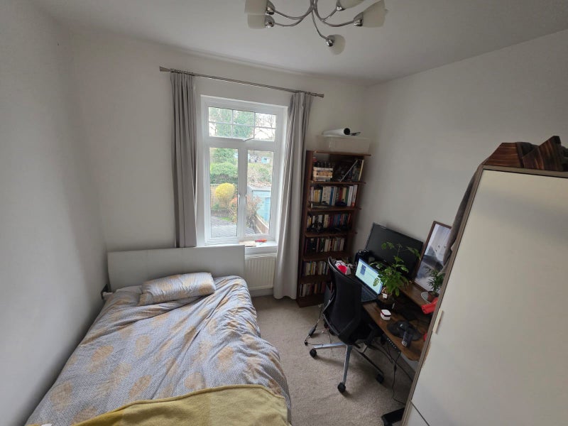 Photo 1: A view of the space by the large wardrobe, ideal for a desk (the one in the photo belongs to tenant)