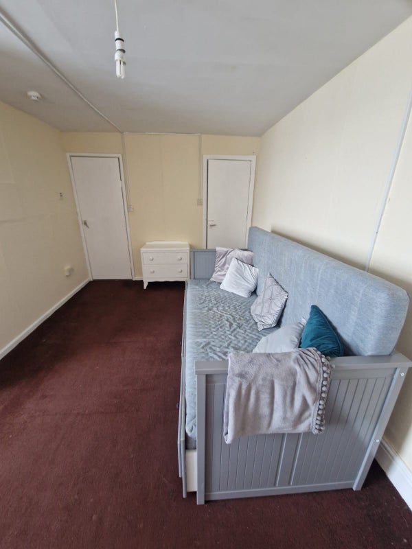 Photo 1: Bedroom with adjustable double bed