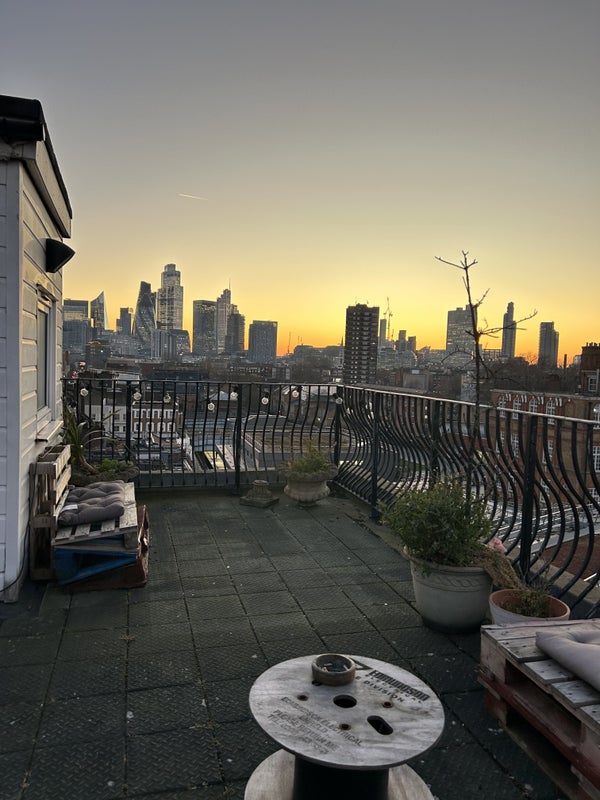 Photo 1: Gorgeous sunset over the City skyline in your *private rooftop* (eek!!).