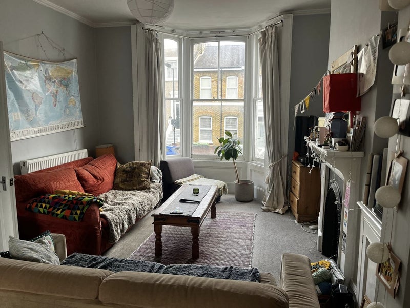 Photo 1: Living room / dining room