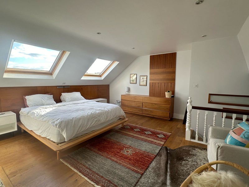 Photo 1: Double Bed with Storage Space Behind, Space for Small Lounge In Front. 