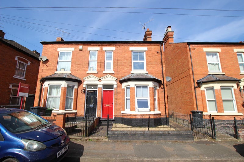 Photo 1: Front - Nelson Road