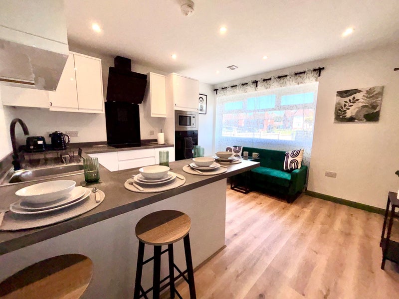 Photo 1: Shared Kitchen/ Living Space