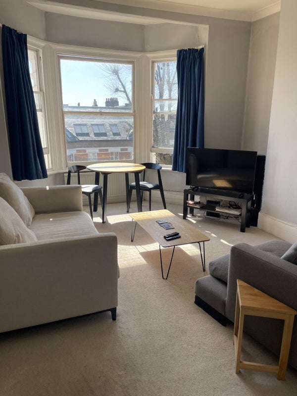 Photo 1: Living Room (South facing)