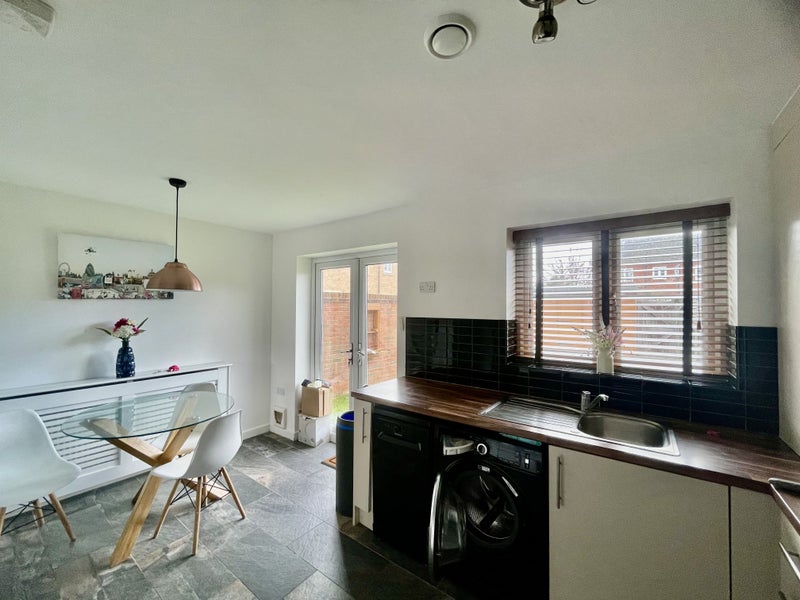 Photo 1: Kitchen Dining Room