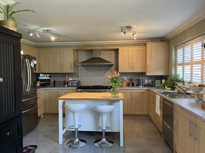 Photo 7: Kitchen with additional dining table not shown in picture 