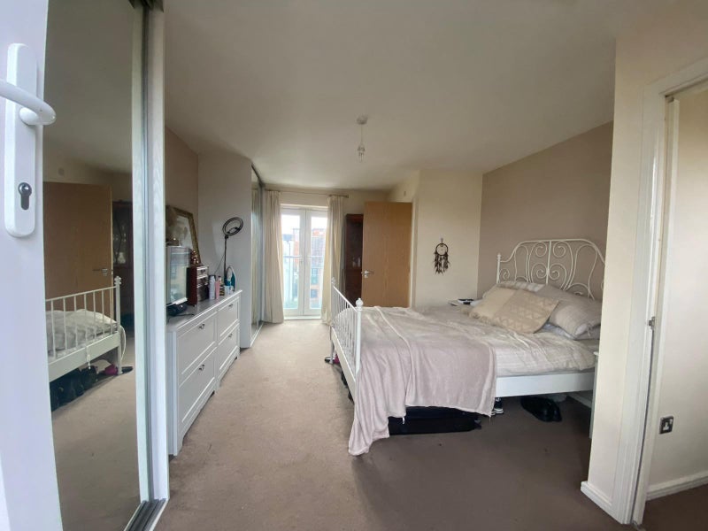 Photo 6: Whole top floor features 2 extra large built in wardrobes with mirror