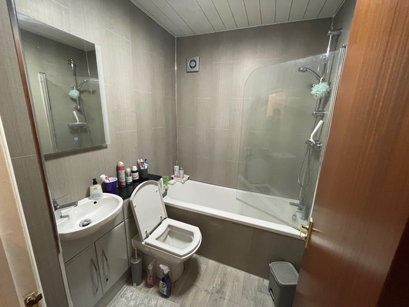 Photo 1: Shared bathroom
