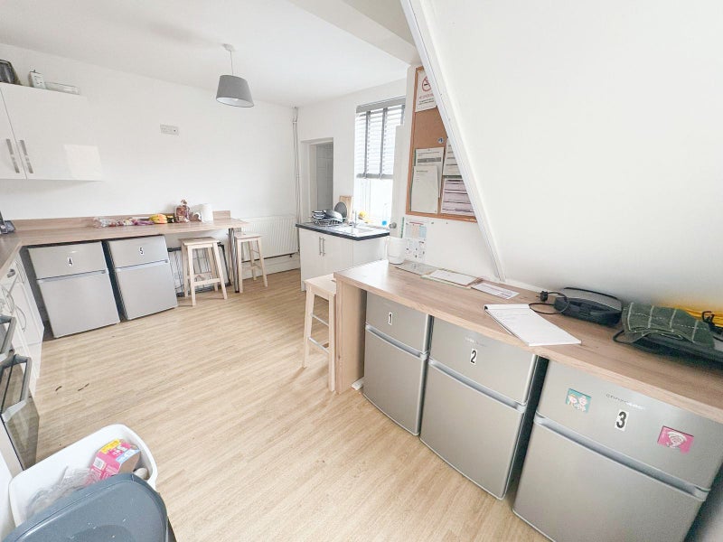 Photo 1: Each tenant has their own fridge/ Freezer space in the communal Kitchen 