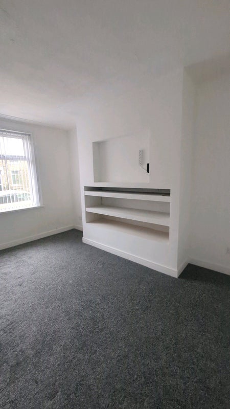 Photo 1: Media wall lounge