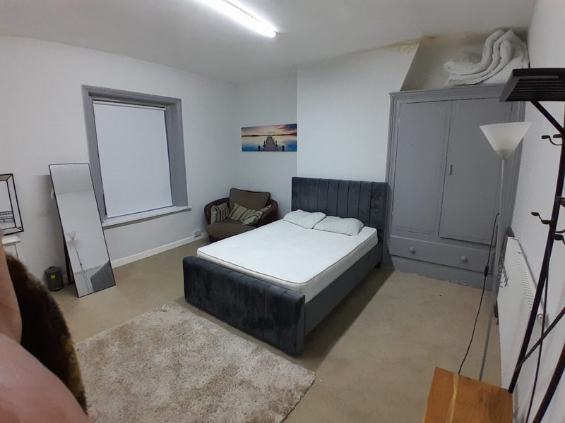 Photo 1: Large double room with sofa table chairs