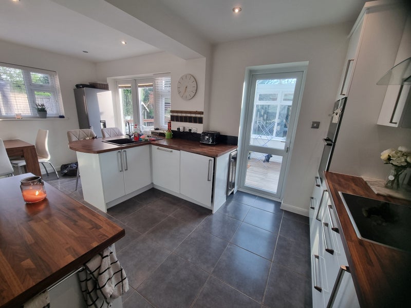 Photo 1: Kitchen with separate utility room