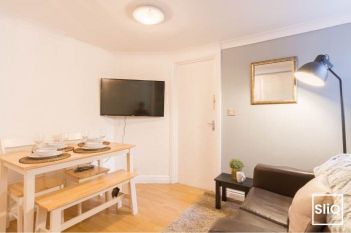 Photo 1: Living and Dining Area