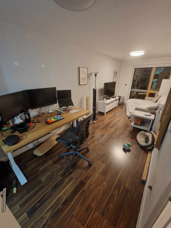 Photo 1: Living room - desk