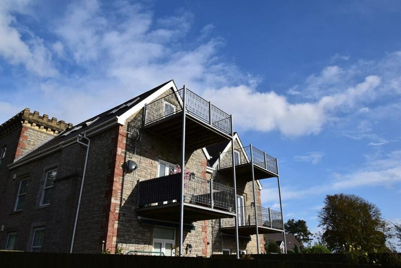 Photo 1: Exterior from car park