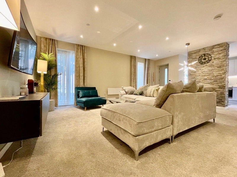 Photo 1: Living room (shared)