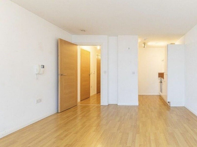 Photo 1: Living room.