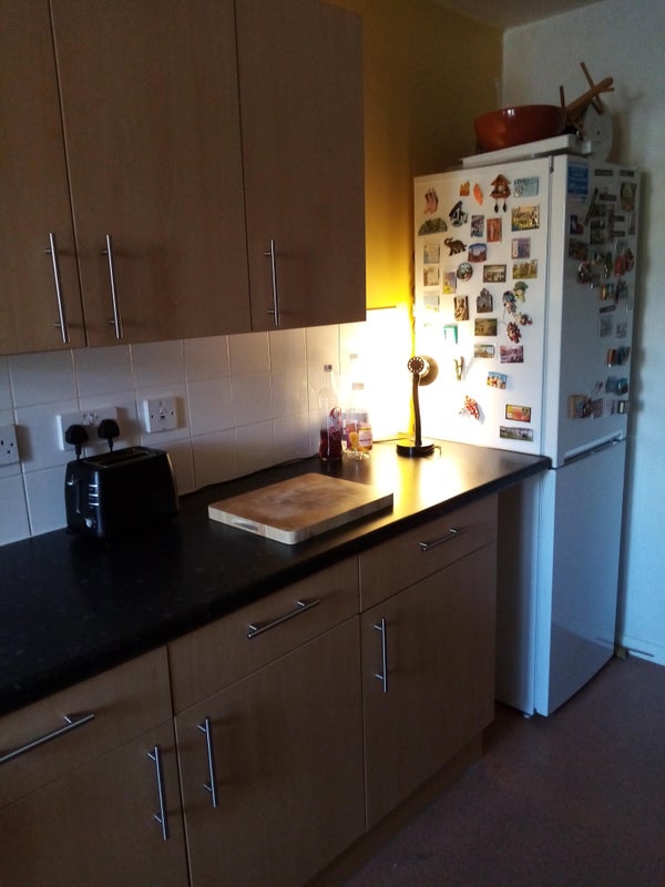 Photo 1: Kitchen + multi storage space