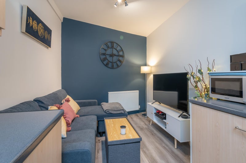 Photo 1: Living Room Space