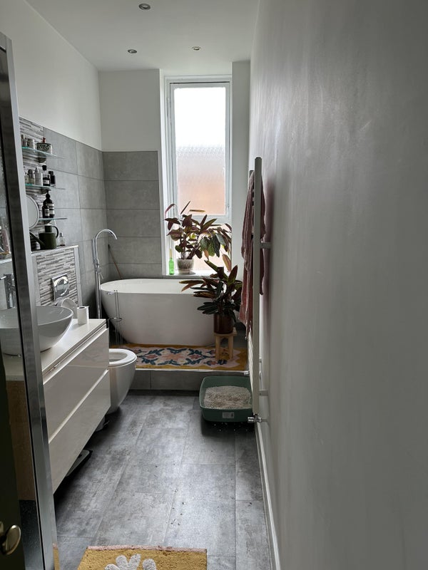 Photo 1: Shared bathroom