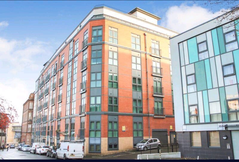 Photo 1: Exterior of the building