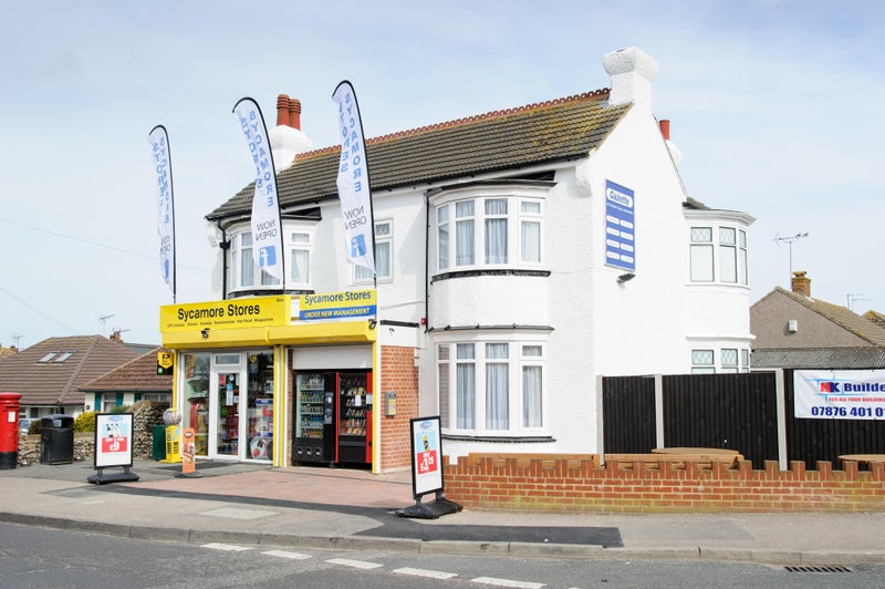 Photo 1: Front exterior - access to the rear via private driveway / garden 