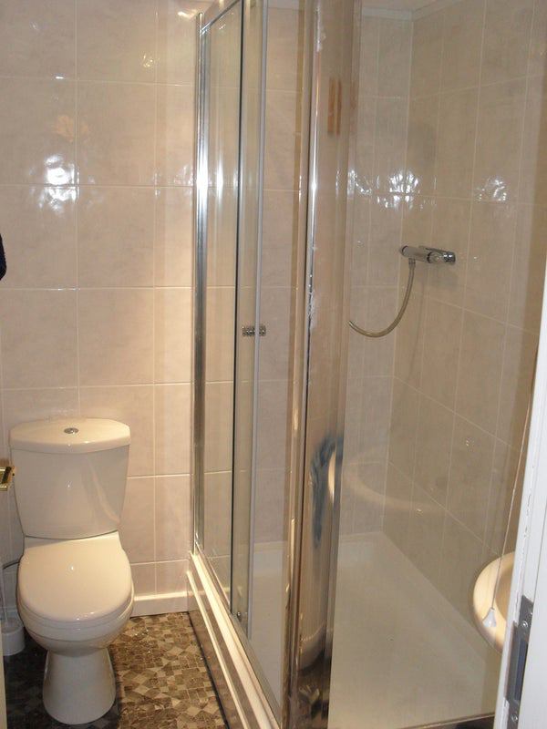 Photo 1: Shared Bathroom
