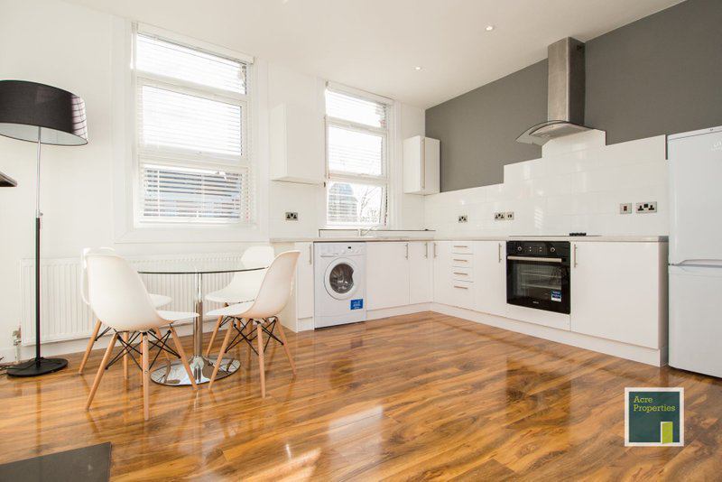 Photo 1: Open plan kitchen, dining, lounge