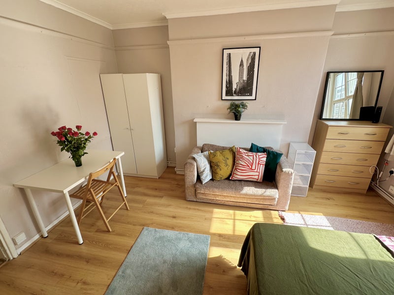 Photo 1: Large master with the couch, also the router is in your room then you got high speed internet