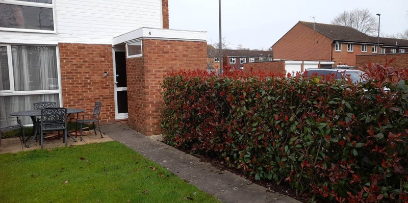 Photo 1: Front of house - March 2025
