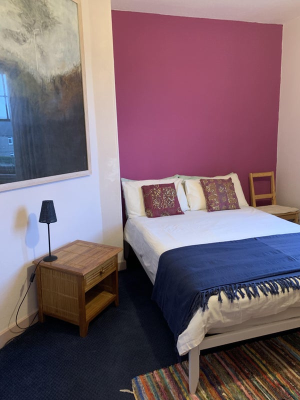 Photo 1: Bedroom one, looks onto back garden.