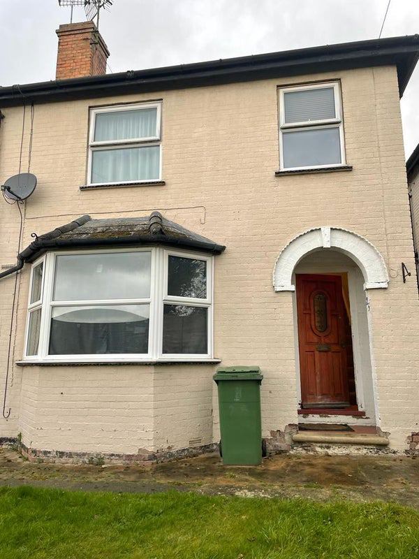 Photo 1: Front of property