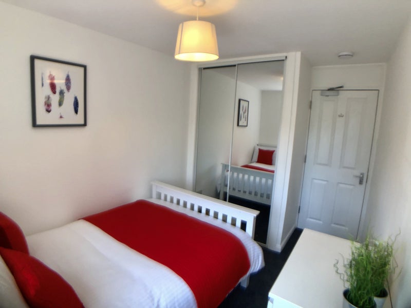 Photo 1: Wall to ceiling wardrobe space for ample storage