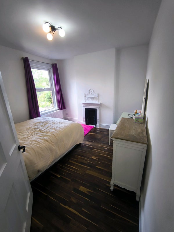 Photo 1: Larger room