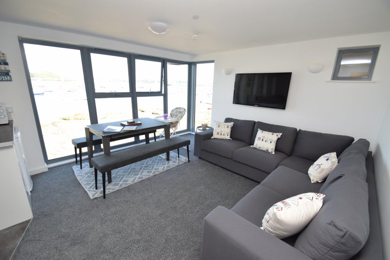 Photo 1: Living room with Sea View