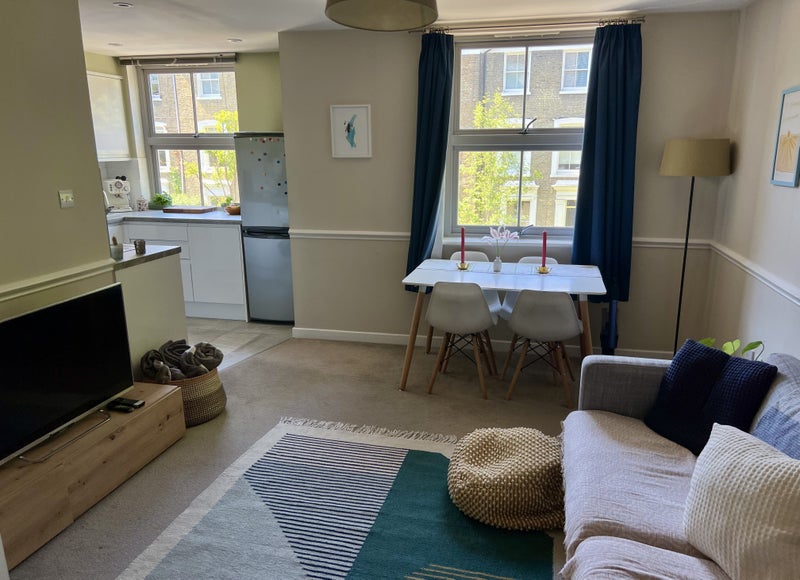 Photo 1: Bright living room with views over lovely quiet street