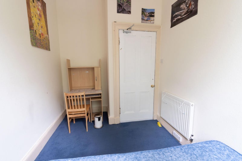 Photo 1: The available bedroom