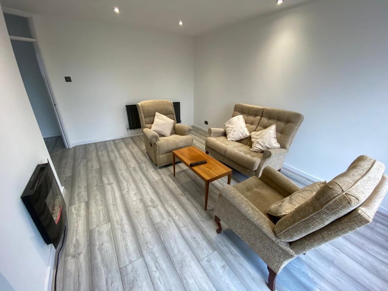 Photo 1: Spacious living/dining room