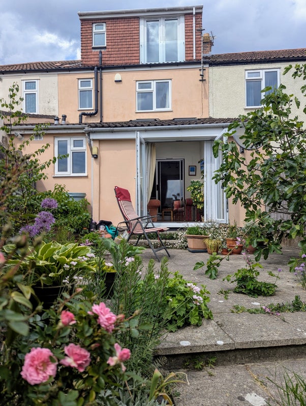 Photo 1: House from Garden