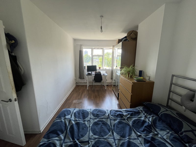 Photo 1: Bright and spacious bedroom.