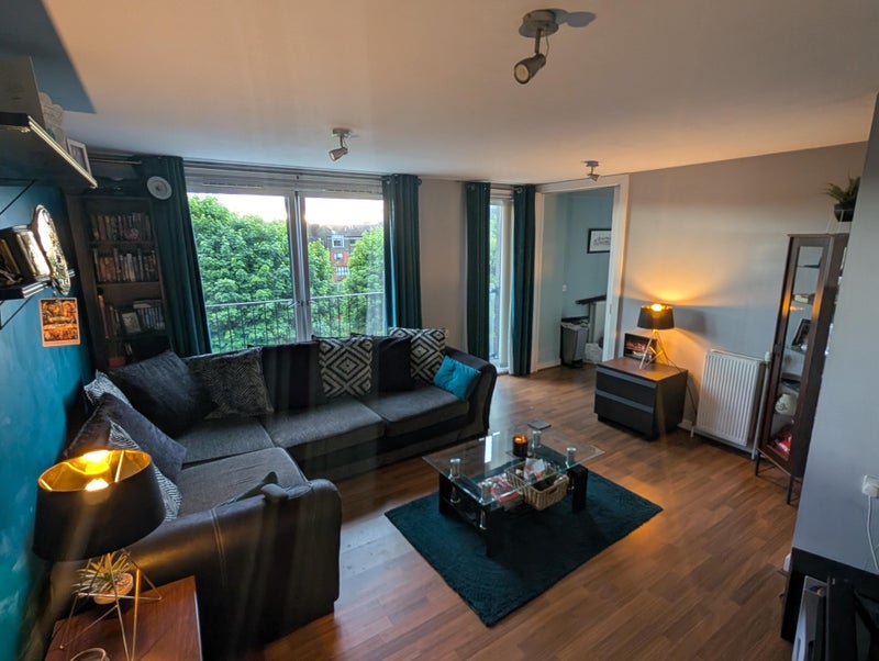 Photo 1: Shared Living Room