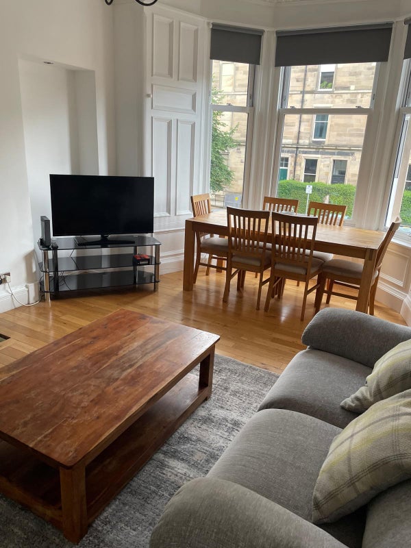 Photo 1: Shared living room