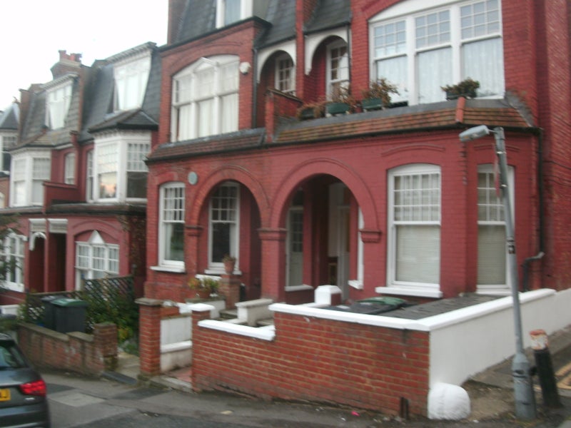 Photo 1: Front of house