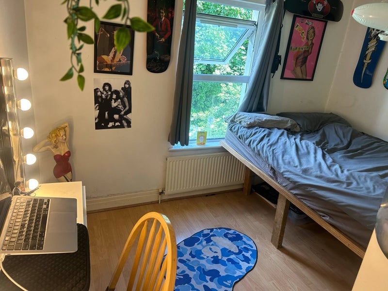 Photo 1: The room advertised - double bed. Built in desk + underneath bed storage / Includes tall lamp, chair