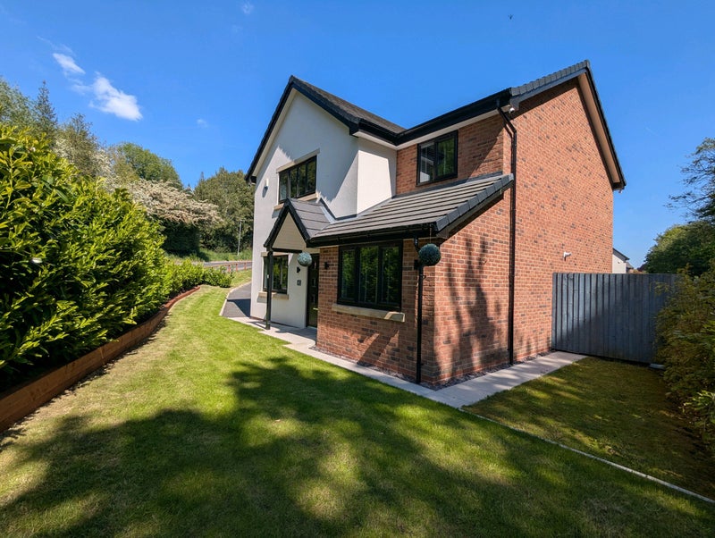 Photo 1: Front of property